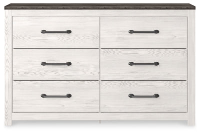 Cama Gerridan King con paneles, cómoda y dos mesitas de noche