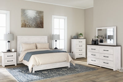 Cama Queen con paneles Gerridan, tocador, espejo y cómoda