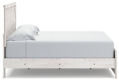 Cama Gerridan King con paneles, cómoda y dos mesitas de noche