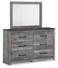 Bronyan King Panel Bed, Dresser, Mirror and Nightstand