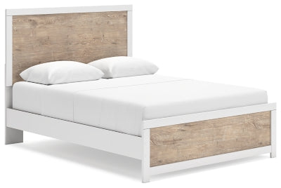 Cama Queen Charbitt con paneles, tocador, espejo y mesita de noche