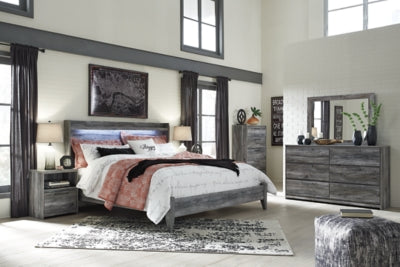 Cama Baystorm King con paneles, tocador, espejo, cómoda y dos mesitas de noche