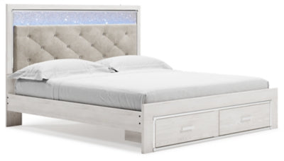 Cama King Altyra con almacenaje tapizado, tocador, espejo y dos mesitas de noche