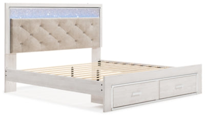 Cama King Altyra con almacenaje tapizado, tocador, espejo y dos mesitas de noche