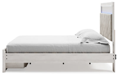 Cama King Altyra con almacenaje tapizado, tocador, espejo y dos mesitas de noche