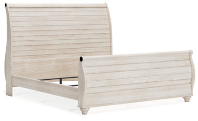 Cama Willowton King tipo trineo, tocador, espejo, cómoda y mesita de noche