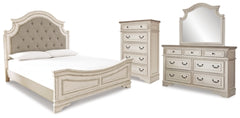 Cama tapizada con paneles Realyn King, tocador, espejo y cómoda