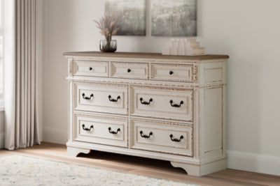 Realyn Queen Upholstery Panel Bed, Dresser, Chest, Nightstand, and Vanity Set