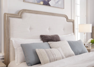 Jorlaina King Upholstered Panel Bed