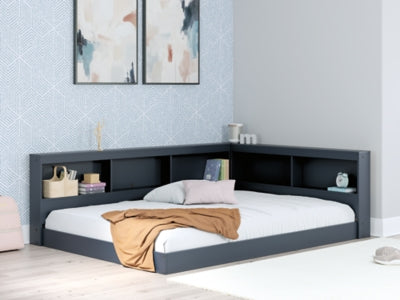 Cama Simmenfort con estantería completa y espacio de almacenamiento