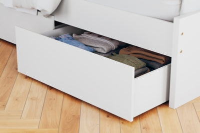 Cama de plataforma con dos paneles Onita y almacenamiento en un lado