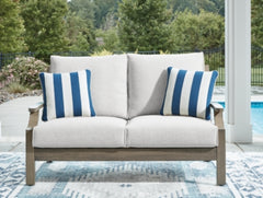 Loveseat de exterior Rainier Ranch con cojín