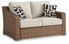 Loveseat de exterior Beachcroft con cojín