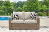 Loveseat de exterior Beachcroft con cojín