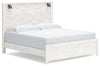 Cama Gerridan King con paneles, tocador, espejo y dos mesitas de noche