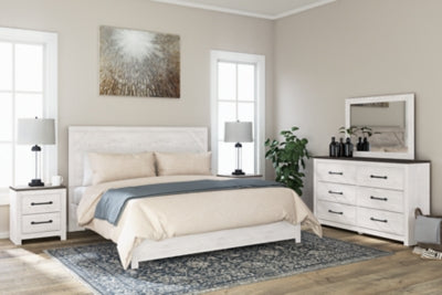 Cama Gerridan King con paneles, tocador, espejo y dos mesitas de noche