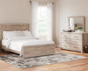 Cama queen con paneles, cómoda y espejo Senniberg