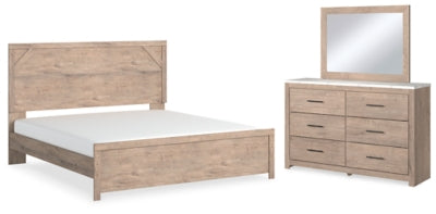 Cama Senniberg King con paneles, cómoda y espejo