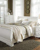 Cama Anarasia Queen tipo trineo con cómoda y mesita de noche