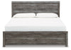 Cama King Bronyan con paneles, tocador, espejo y mesita de noche