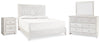 Cama Paxberry King con paneles, tocador, espejo y mesita de noche
