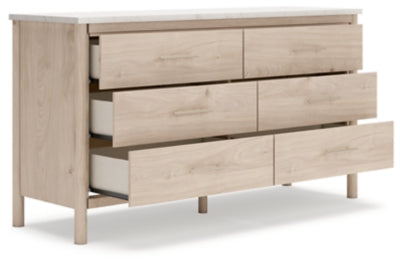 Cama Queen Cadmori con paneles tapizados, cómoda y mesita de noche