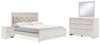 Cama King Altyra con paneles tapizados, tocador, espejo y mesita de noche