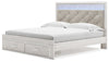 Cama King Altyra con almacenamiento, tocador, espejo y mesita de noche con paneles tapizados