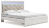Cama King Altyra con almacenaje tapizado, tocador, espejo, cómoda y mesita de noche