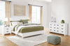Cama Queen con paneles, cómoda y mesita de noche Binterglen