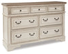 Realyn Queen Upholstery Panel Bed, Dresser, Chest, Nightstand, and Vanity Set