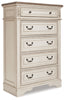 Realyn Queen Upholstered Panel Bed and Chest