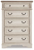 Realyn Queen Upholstered Panel Bed and Chest