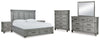 Cama California King Russelyn con paneles, tocador, espejo, cómoda y dos mesitas de noche