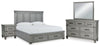 Cama King Russelyn con almacenamiento, tocador, espejo y dos mesitas de noche