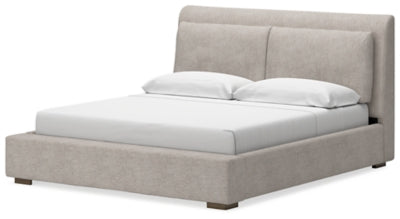 Cama tapizada Cabalynn California King, cómoda y espejo