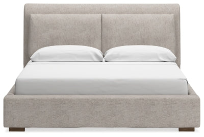 Cama tapizada Cabalynn California King, cómoda y espejo