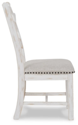 Mesa de comedor Valebeck y 8 sillas con servidor