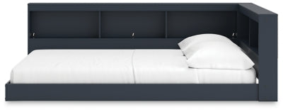 Cama Simmenfort con estantería completa y espacio de almacenamiento