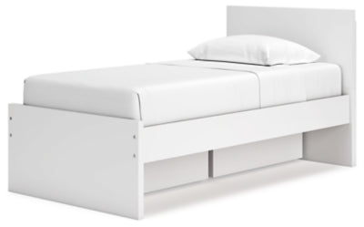 Cama de plataforma con dos paneles Onita y almacenamiento en un lado