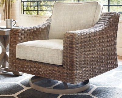 Sillón giratorio de exterior Beachcroft con cojín