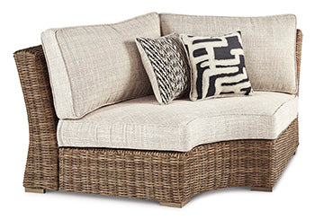 Silla de esquina curva para exteriores Beachcroft con cojín